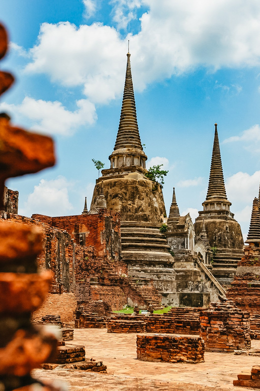 The Old Siam: Ayutthaya Temples Small Group Tour with Lunch - Wat Mahathat: the Buddha head in Bodhi tree roots