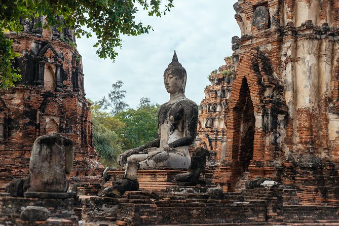 The Ultimate Ancient city of Ayutthaya Private Day Trip - Wat Mahathat and the bodhi-tree Buddha head