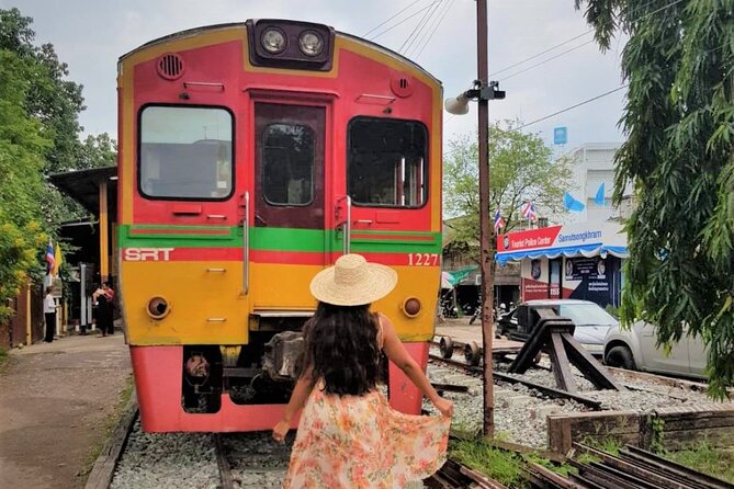 Train & Floating Market Food Adventure + Scenic train ride - Mae Klong Railway Market, a morning market built around timing